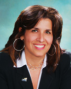 A portrait of a staff member